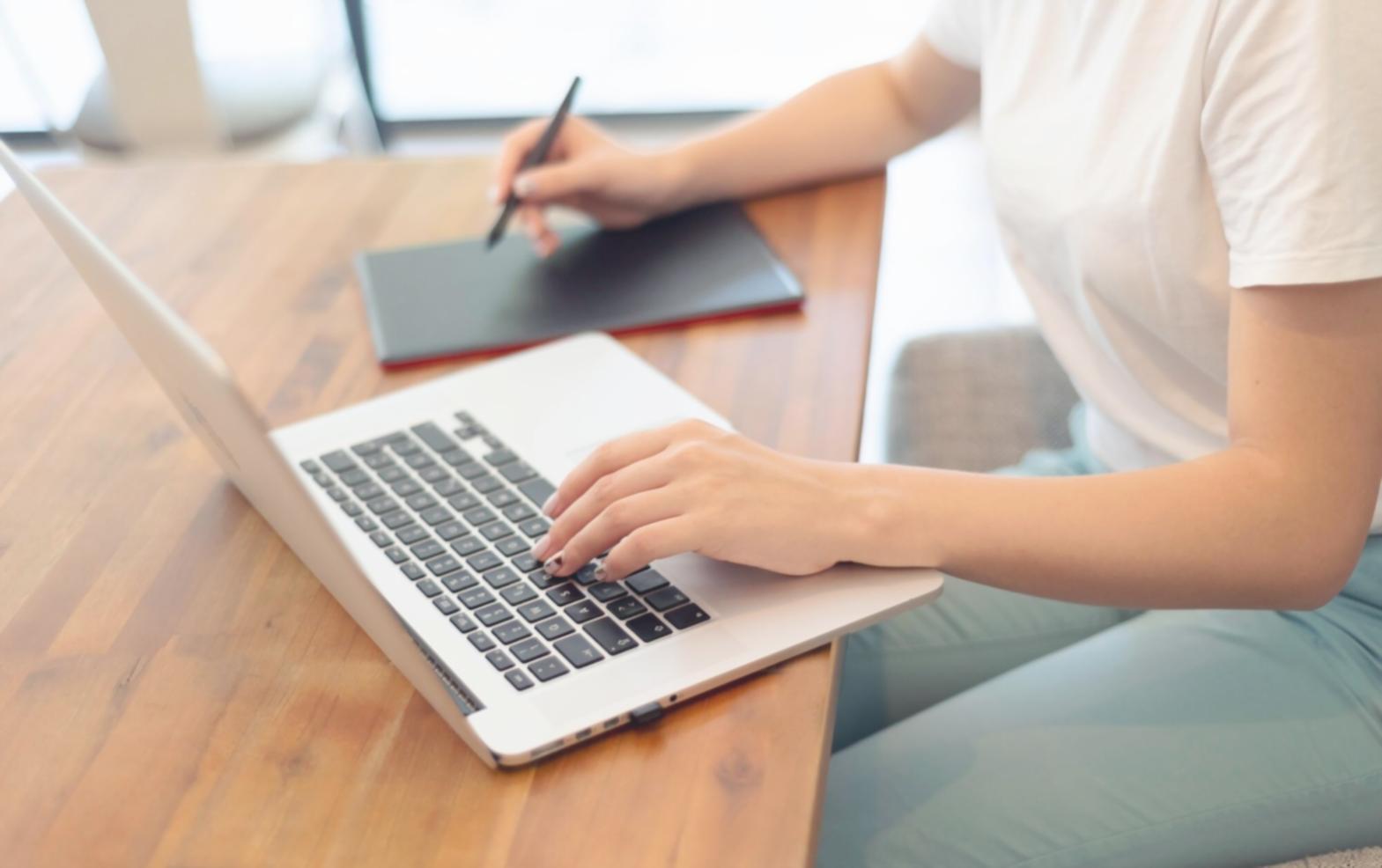 Business planning workspace with research materials and strategic notes